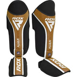 RDX sípcsont és lábfejvédők Aura+ T17, fekete-arany