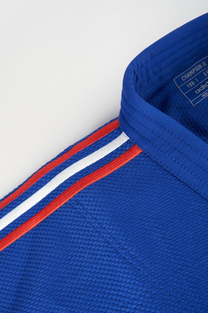 Adidas JU kimonó nemzeti szalagokkal IJF Champion III Slim fit 730g, kék 